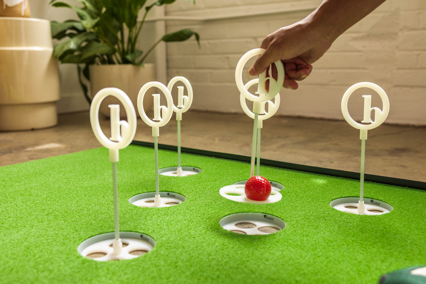 BirdiePong: Putting + Golf Beer Pong Combined